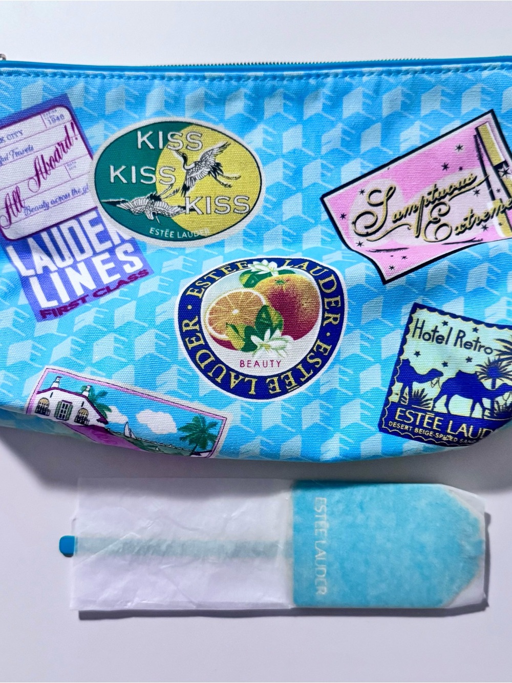 Estee Lauder Blue Cosmetic Pouch with Travel Badge Motifs